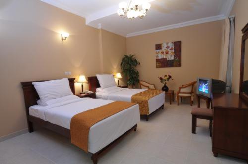 Le Grand Hotel Doha Quarto foto
